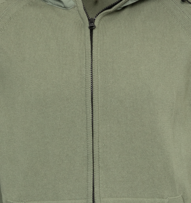 Image 3 of 3 - GREEN - C.P. COMPANY Cotton Mixed Hooded Knit featuring stand-up collar, adjustable hood, full zip fastening, lens detail, kangaroo pockets, ribbed cuffs, 7 gauge knit thickness and regular fit. 100% cotton. 