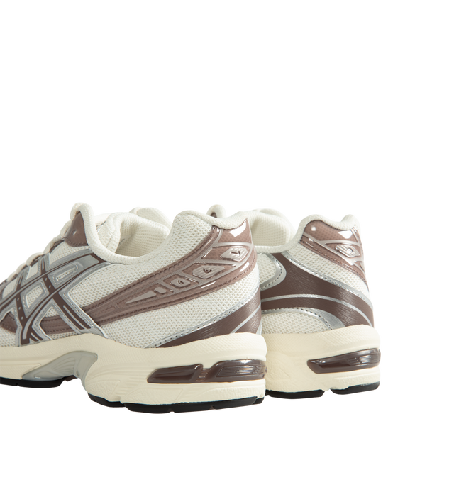 Image 3 of 5 - NEUTRAL - Asics Unisex Gel-1130 Sneakers feature patent leather overlays, clear gloss TPU accents, and breathable mesh underlays for a modern look. Enhanced with cushioning and support designed for all-day comfort, the GEL-1130 delivers the perfect blend of heritage performance and everyday wearability. Main Material: Mesh Upper with Patent Leather and Gloss TPU Overlays. Cushioning: GEL Technology. Details: GEL-1000 Series Heritage Design, Breathable Mesh Construction *Unisex style in men's  