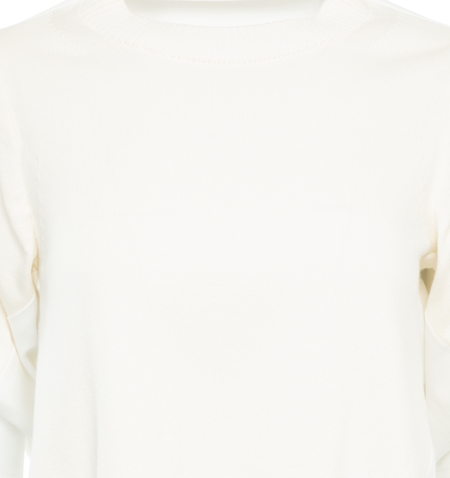 Image 3 of 3 - WHITE - SACAI Denim Knit Pullover featuring relaxed fit, round neck, short puffed sleeves, knit panel at front and asymmetric raw hem. 55% cotton, 45% polyester. 100% cotton. Made in Japan. 