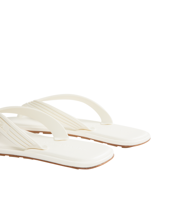 Image 3 of 4 - WHITE - BOTTEGA VENETA Sampieri Thong featuring rubber thong sandal with leather insole. Lining: lambskin. Rubber-injected leather outsole. Thermoplastic polyurethane. Made in Italy.  