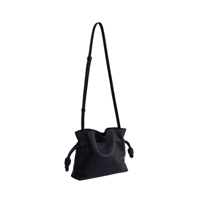 Image 2 of 3 - NAVY - LOEWE Flamenco Mini Napa Drawstring Clutch Bag featuring suede lining, coiled knot drawstring and hidden magnetic closure. 7"H x 9.4"W x 3.5"D. Convertible shoulder strap: 11 1/2" 23 1/2" drop. Nappa calf. Made in Spain. 