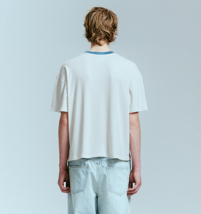 Image 4 of 4 - WHITE - NAHMIAS Blossom Ringer T-shirt featuring crew neckline with contrast ringer trim, Nahmias Bloom graphic at chest, short sleeves and regular fit. 100% cotton. 