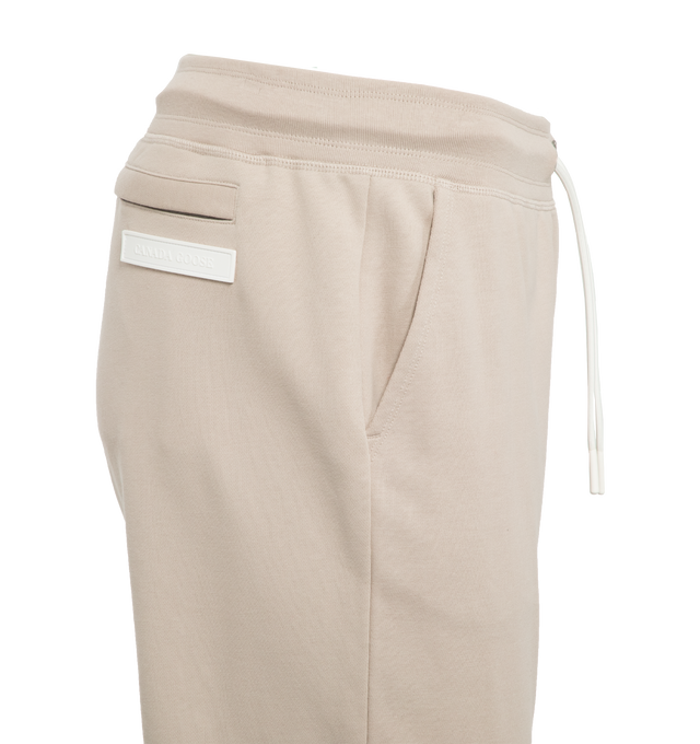 Image 3 of 3 - NEUTRAL - CANADA GOOSE Huron Pants featuring regular-fit, elasticated drawstring waist, elasticated ankle and high-waisted fit. 100% cotton. 