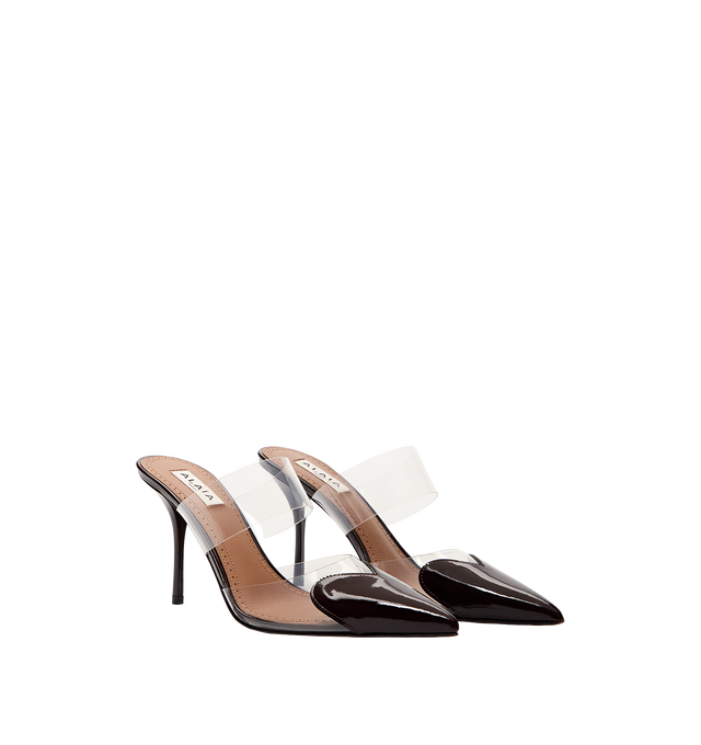Image 1 of 4 - BLACK - ALAIA HEART MULES IN PATENT CALFSKIN with 90mm heel, featuring heart cut at the front of the shoe. 60% calfskin, 40% polyurethan with 100% lambskin lining and calfskin sole. Made in Italy. 