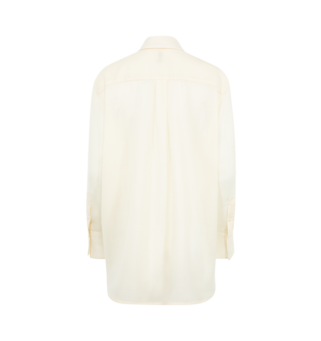 Image 2 of 2 - WHITE - TOTEME shirt crafted from delicate, semi-sheer wool voile for a play on transparency. It has a relaxed, fluid silhouette buttoned along the placket and cuffs and finished with a classic box pleat at the back. 100% wool RWS. 