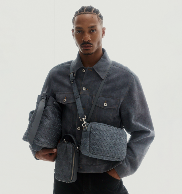 Image 3 of 6 - GREY - BOTTEGA VENETA Andiamo Messenger Bag featuring intrecciato suede leather messenger with denim effect and adjustable detachable cross-body strap, two interior compartments with two flat open pockets and one zipped pocket and flap closure. Lambskin. Lining: canvas. 10.2" x 14.6" x 5.1 Made in Italy. 