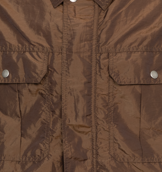 Image 4 of 4 - BROWN - SAINT LAURENT 80's Army Jacket featuring concealed front zip closure, two box pleated patch pocketswith flaps, two welt pockets, pointed collar, snap button cuffs and adjustable snap button tabs at side hem. 70% polyamide, 30% polyester. 