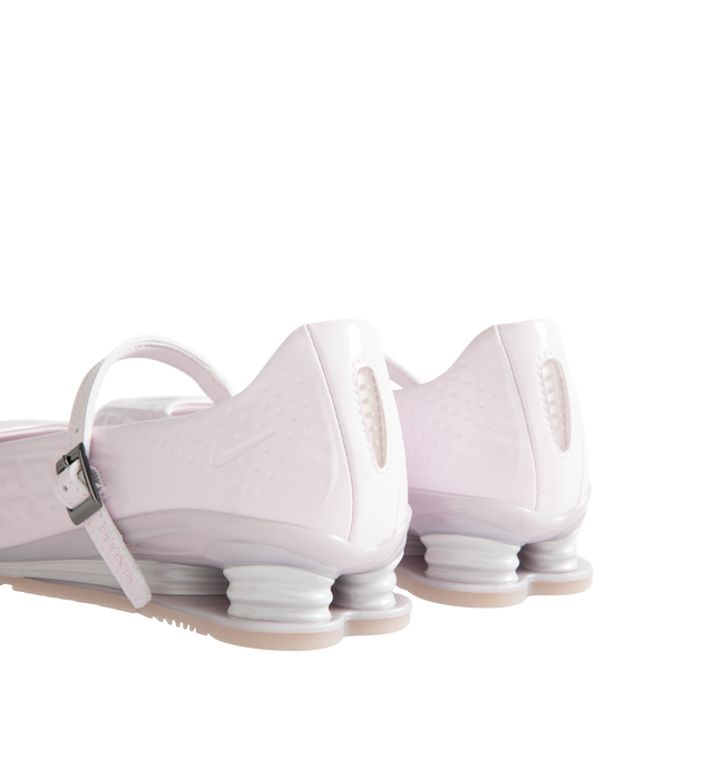 Image 3 of 5 - PINK - Nike Womens Shox Z Calistra Shoe is a ballet-inspired flat on top of sleek sneaker-inspired heel cushioning. Designed with an adjustable midfoot strap, Nike Shox Z cushioning pillars, signature Nike and Shox branding, and durable rubber outsole. Upper: Synthetic Leather; Cushioning: Nike Shox Z; Outsole: Rubber. Imported 