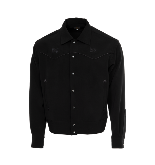 Image 1 of 3 - BLACK - NEEDLES Cowboy Jacket featuring stretch polyester twill, piping and logo embroidered throughout, spread collar, dropped shoulders, press-stud closure, welt pockets, two-button barrel cuffs and darts at back. 89% polyester, 11% polyurethane. Made in Japan.