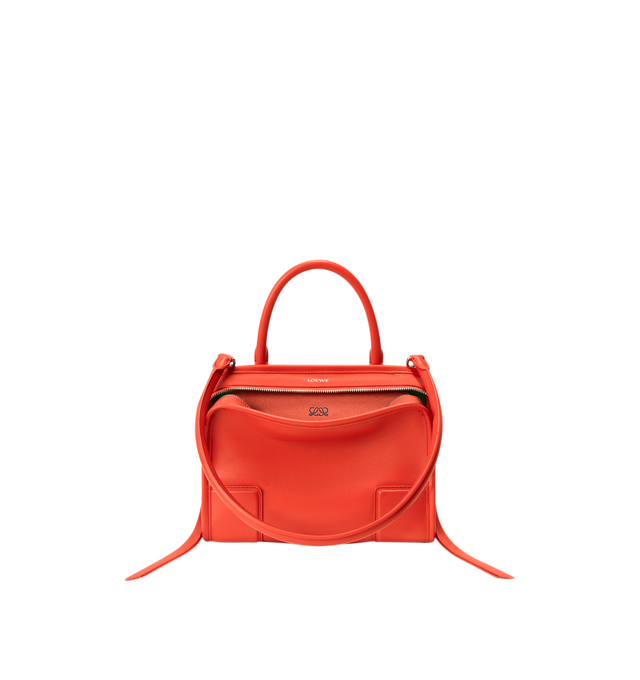 Image 5 of 17 - ORANGE - Loewe Small Amazona 180 Bag in leather features a relaxed silhouette anchored by a single toron top handle, designed to be carried open, while a concealed closure secures the main compartment, three carry options: short handle, removable shoulder strap and crossbody, zip closure with two leather zip pullers, two compartments, main compartment closed with magnetic closure, internal flat pocket, left side d-ring for customization, nappa lambskin lining, and embossed double L branding. 