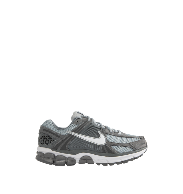 Image 1 of 5 - GREY - NIKE Zoom Vomero 5 Sneaker featuring upper with real and synthetic leather for a layered, mesh panels and ventilation ports on the heel, Zoom Air cushioning, plastic caging on the side, rubber outsole and reflective details. 