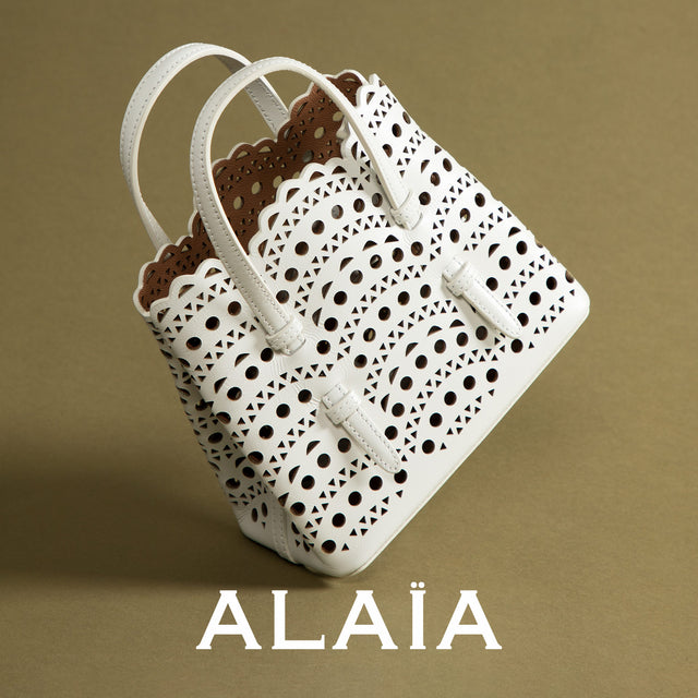 Alaia Micro tote bag, crafted from calfskin leather with Vienne pattern inspired by precious lace and moucharabieh architectural openwork 