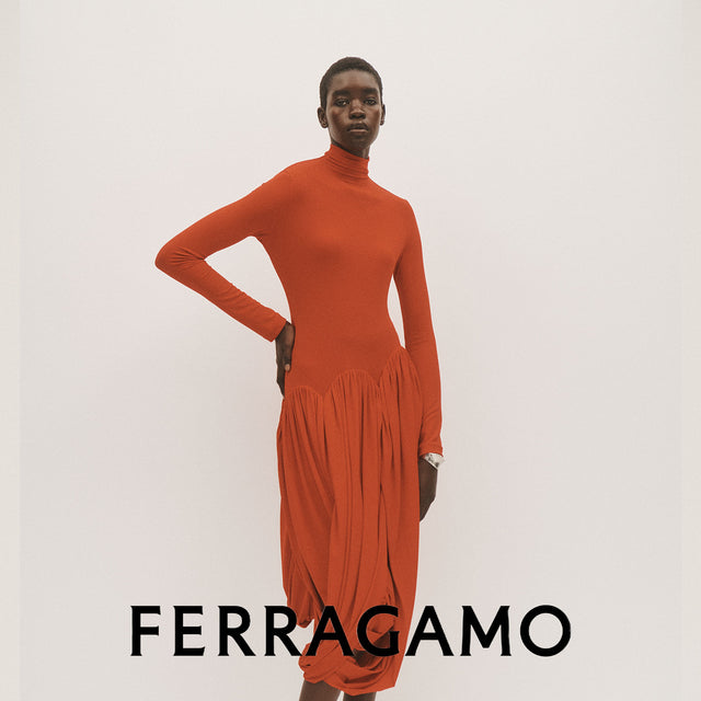 model wearing Ferragamo red turtleneck dress 