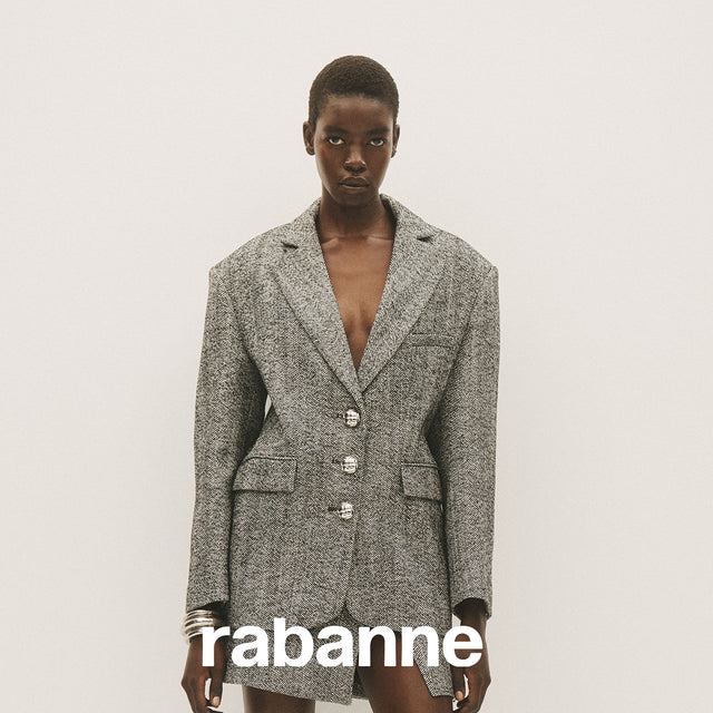 Woman wearing Rabanne grey wool blazer and skirt 