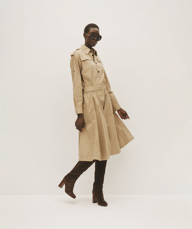 Woman wearing Bottega Veneta twill shirtdress with knee high Khaite boots 