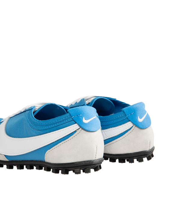 Image 3 of 5 - BLUE - Nike Men's Moon Shoe OG SP Sneakers feature an Italy Blue and Neutral Grey nylon upper with black and white accents and a leather Swoosh. Inspired by Nike's original 1970s running shoe, the streamlined silhouette is finished with a rubber Waffle outsole for durable traction. Upper: Nylon and Leather. Sole: Rubber. 
