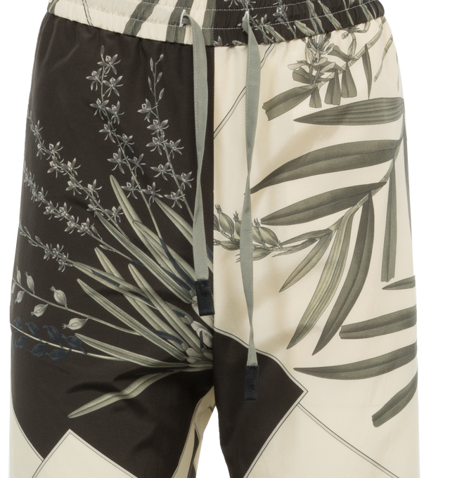 Image 4 of 4 - BLACK - Loewe Paula's Ibiza Pyjama Trousers crafted in lightweight cotton silk habotai in a relaxed fit, regular length, mid waist, straight leg with placed tropical flower print with trompe loeil scarf details. Featuring elasticated waist with drawstring, seam pockets, rear patch pocket and LOEWE embossed leather tip placed on the drawstring. Main material: Cotton/Silk. Made in: Italy. Loewe Paula's Ibiza 2024 collection is inspired by the iconic Paula's boutique, synonymous with the counter 