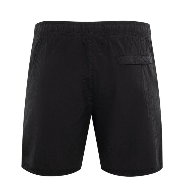 Image 2 of 2 - BLACK - STONE ISLAND Swim Shorts featuring textured finish, elasticated waistband, two side slash pockets, signature Compass motif, eyelet detailing, rear zip-fastening pocket, partial lining, thigh-length and internal drawstring fastening waist. 100% ECONYL. 