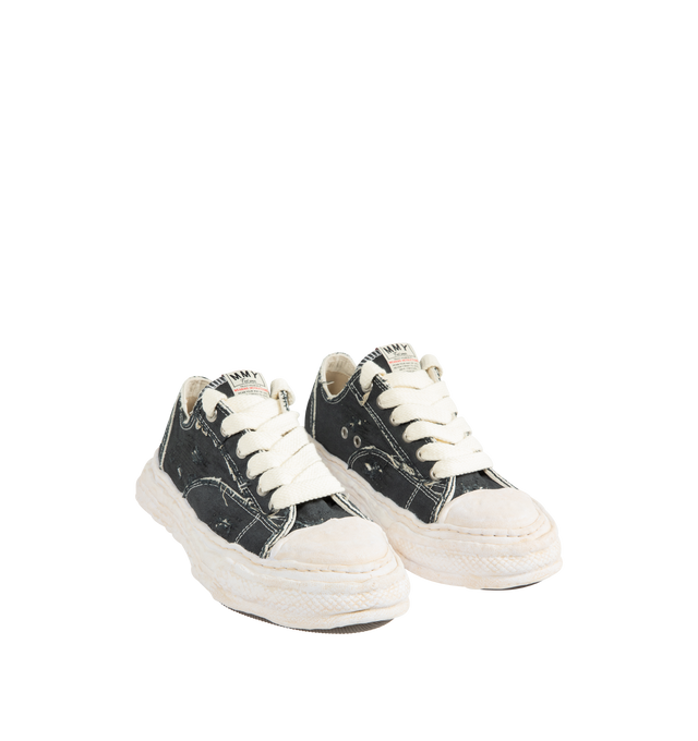 Image 2 of 5 - BLACK - Maison Mihara Yasuhiro Men's Peterson23 Sneakers feature the brand's signature hand-sculpted OG sole, a ripped overdye canvas upper, and a relaxed low-top silhouette for a bold contemporary look. Designed for the Spring/Summer 2026 collection, these designer sneakers combine Maison Mihara Yasuhiro's experimental aesthetic with a wider fit, layered overdye finish, distressed detailing, and a three-dimensional rubber toe cap that echoes the sculptural sole. Intentional fading and distre 