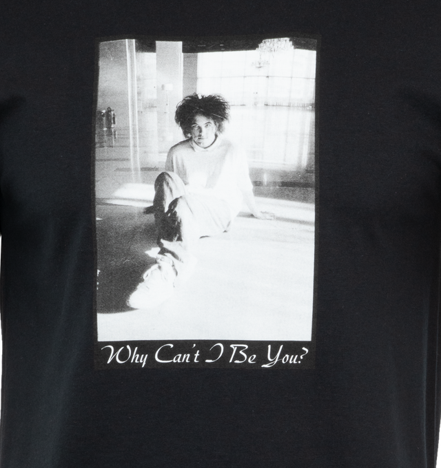 BLACK - NOAH X THE CURE "WHY CAN'T I BE YOU" TEE crafted from 100% cotton. Printed graphic on front and back. Made in Honduras, printed in USA. Unisex style with men's sizing.