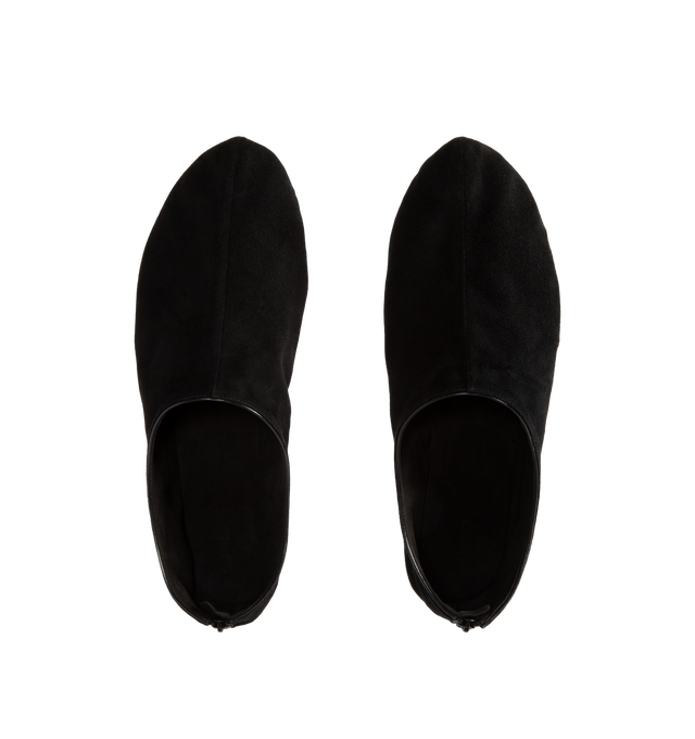 Image 4 of 4 - BLACK - The Row Women's Stellene Slipper is crafted from ultrasoft goatskin suede and features a minimal silhouette with a round toe, back zip closure, and a thin leather sole. Designed for everyday elegance, this streamlined style is lined in goatskin leather and finished with a supple suede upper for exceptional comfort and flexibility. Main Material: 100% Goatskin Suede. Lining: 100% Goatskin Leather. 