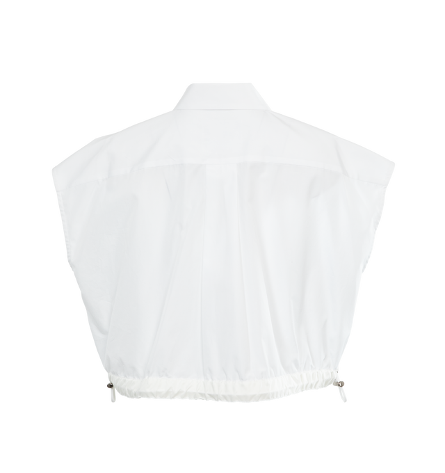 Image 2 of 3 - WHITE - SACAI Thomas Mason Cropped Poplin Shirt featuring partially concealed button and snap fastenings through front, sleeveless, collar, front patch pockets and drawstring waist. 100% cotton. 