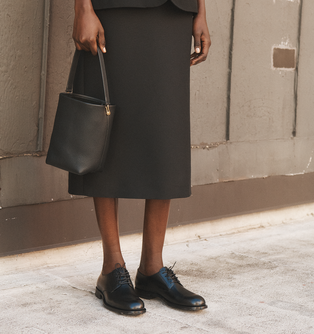 Image 6 of 7 - BLACK - THE ROW Novus Derby Shoe featuring classic lace-up oxford in polished calfskin leather with seamless molded construction, almond toe, and hand-stitched detailing. 100% calfskin leather. Made in Italy. 