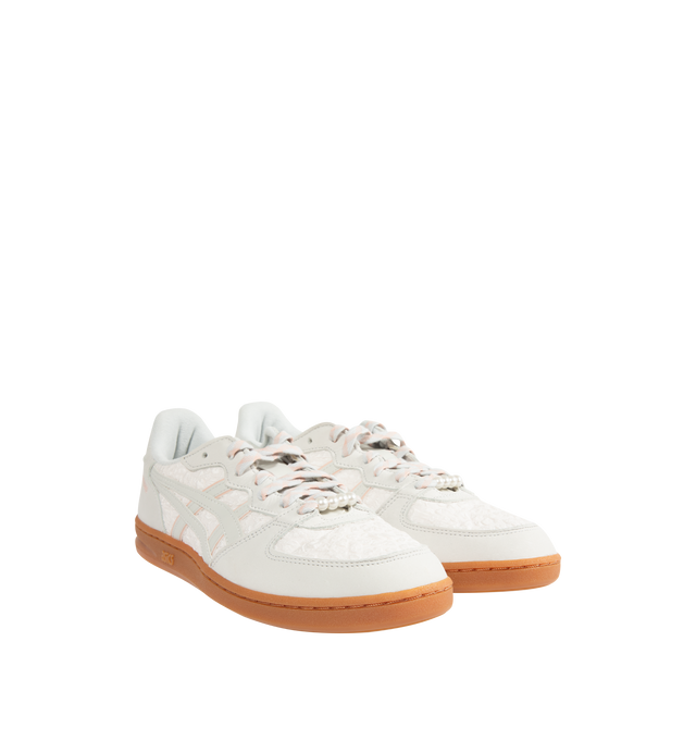 Image 2 of 5 - WHITE - ASICS Skyhand OG Sneaker featuring soft suede upper, FLYTEFOAM PROPEL cushioning, EVA heel wedge, pearl-like shoelace accessory, patterned shoelace and rubber outsole. 