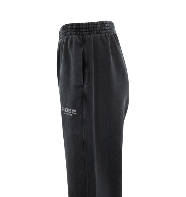 Image 3 of 3 - BLACK - MARTINE ROSE Wide Leg Trackpant featuring wide leg pant, elastic waistband, seasonal logo, oversized fit and full length. 100% cotton. 