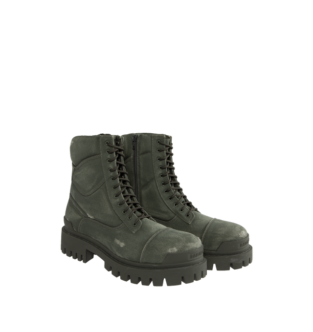 Image 2 of 4 - GREEN - BALENCIAGA Combat Strike Boot featuring cotton canvas, lace-up boot, extra round toe, washed and worn-out effect, 20mm arch, inner zip, visible top-stitching, 11 eyelets lace-up vamp, thick toothed rubber outsole and Balenciaga logo in the front and in the back. Made in Italy. 