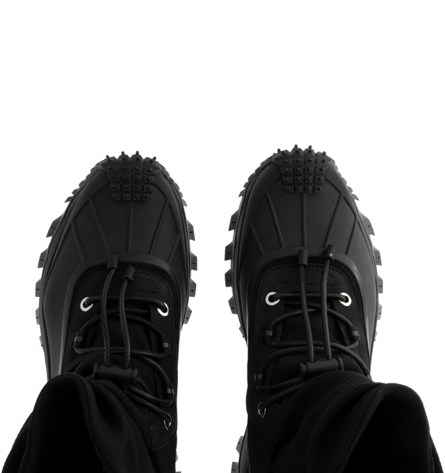 Image 4 of 4 - BLACK - Moncler x EE72 by Edward Enninful Trailgrip Storm Boots featuring stretch nylon, mesh in-sole, elastic and lace-up closure, TPU spoiler, EVA midsole and Special Vibram MEGAGRIP rubber compound tread. Calf height: 14 cm. Sole height: 4.5 cm. 100% polyamide. Sole: elastodiene. Made in Vietnam. 
