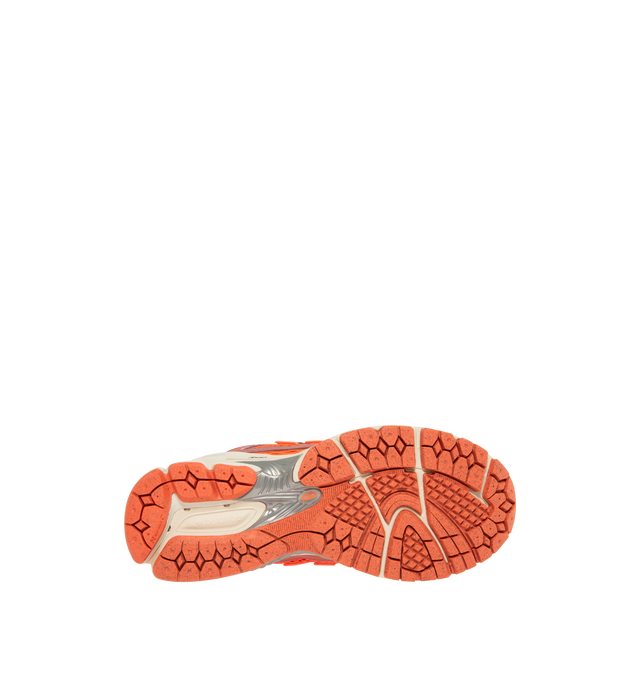 Image 4 of 5 - ORANGE - NEW BALANCE 1906R Sneakers featuring mesh upper with synthetic overlays, ACTEVA LITE midsole cushioning, ABZORB SBS heel cushioning, N-ergy outsole provides superior shock absorption, Stability Web outsole technology provides added arch support, TPU heel cage, rubber sole and adjustable lace closure. 