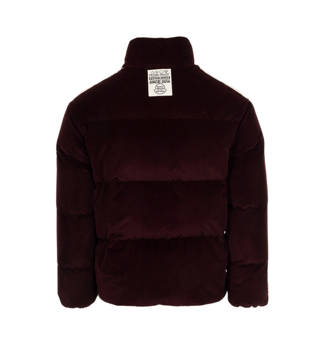 Image 2 of 3 - RED - Moncler Genius X Palm Angels Abrolhos Jacket has a stand collar, a zipper closure, side zip pockets, logo patches, and a drawstring hem. Interior 90% down, 10% feather. Exterior 100% cotton. Made in Romania.  