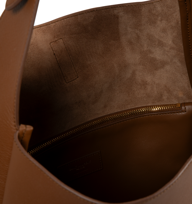 Image 3 of 3 - BROWN - SAINT LAURENT Large Le 5  7 Supple featuring two main compartments, inner zip pocket, adjustable strap, open top with cassandre hook closure and suede lining. 11.8 X 12.2 X 5.1 inches. Handle drop: 11.8 inches. 100% calfskin leather. Made in Italy.  