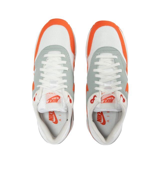 Image 5 of 5 - ORANGE - Nike Air Max 1 86' Premium Sneakers are a lace-up style with a padded low-cut collar, visible Nike Air cushioning, and rubber waffle outsoles.  