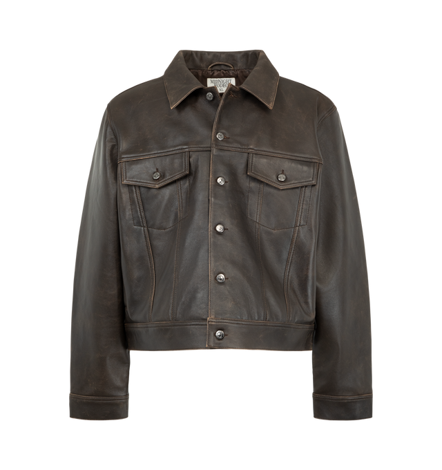 Image 1 of 3 - BROWN - Midnight Rodeo "1968" Leather Trucker Jacket is crafted from pebbled Italian leather and features a cropped trucker silhouette inspired by Elvis Presley's iconic 1968 Comeback Special. Designed with custom branded hardware, double Western yoke detailing, and a smooth midnight satin lining, this Italian-made jacket blends classic Americana influences with Midnight Rodeo's modern edge. Main Material: Pebbled Italian Leather. Lining: Midnight Satin. Fit: Cropped. Made in Italy. 