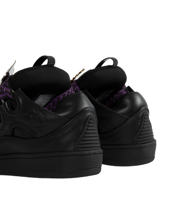 Image 4 of 5 - BLACK - LANVIN LAB X FUTURE Curb and Pins Sneakers featuring leather upper, front pull loop, front lace-up closure, padded tongue, logo details and rubber sole. 100% calf. Lining: 20% elasterell-p, 80% polyamide. Made in Italy. 