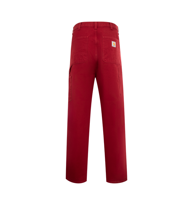 Image 2 of 3 - RED - CARHARTT WIP Double Knee Pant featuring zip fly with button closure, front tonal patches with gold-tone rivets, classic 5-pocket design, hammer loop and utility slip pockets at back and canvas fabric. 100% organic cotton. 