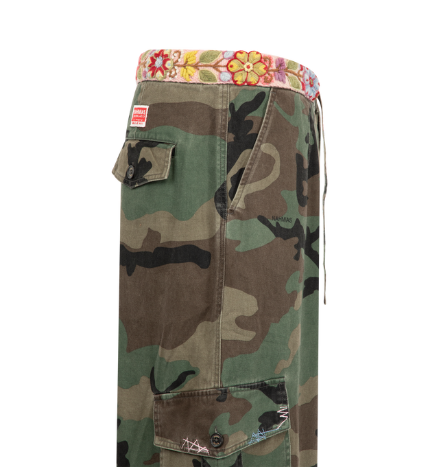Image 3 of 3 - GREEN - Nahmias Men's Camo Volume Cargo is crafted from cotton and features a voluminous cargo silhouette accented by rainbow repair stitch detailing throughout. Designed in Los Angeles, this style is finished with a handcrafted Peruvian crochet belt at the waist, with each belt featuring unique color variations. Main Material: 100% Cotton.  
