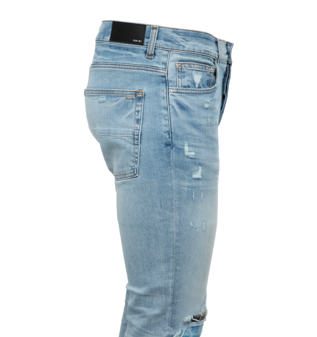 Image 2 of 3 - BLUE - AMIRI Mohair MX-1 Jeans featuring belt loops, five-pocket styling, button-fly, mohair underlay at legs, leather logo patch at back waistband and logo-engraved silver-tone hardware. 98% cotton, 2% elastane. Made in United States. 