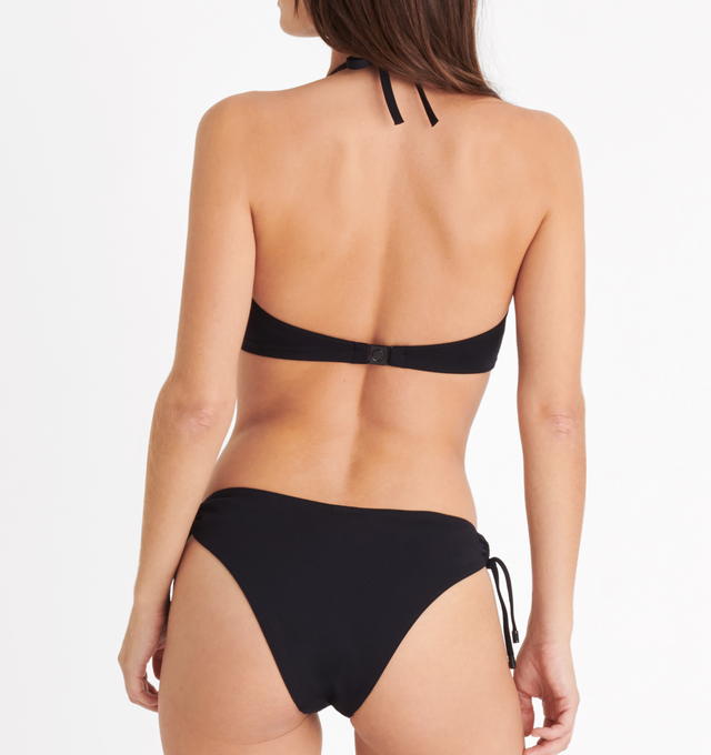Image 5 of 6 - BLACK - ERES Gang Triangle Bikini Top featuring full-cup triangle bikini top, halter tie spaghetti straps, bust darts, side stays and thin back. 84% Polyamid, 16% Spandex. Made in France.  