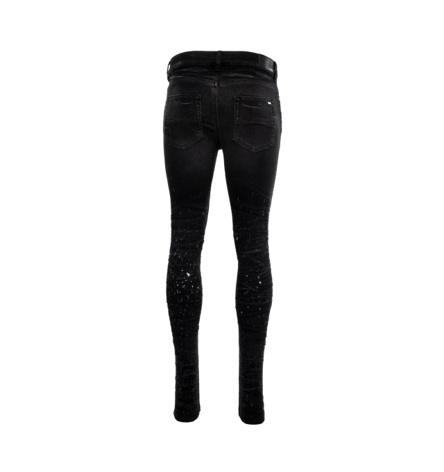 Image 2 of 4 - BLACK - AMIRI Crystal Shotgun Jeans featuring belt loops, five-pocket styling, button-fly, leather logo patch at back waistband and logo-engraved silver-tone hardware. 92% cotton, 6% elastomultiester, 2% elastane. Made in USA. 
