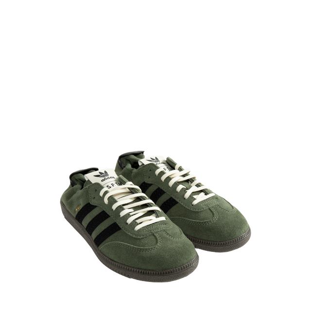 Image 2 of 5 - GREEN - Adidas Originals Men's Samba OG SFTM Shoes are crafted from premium leather and feature a classic low-profile silhouette with lace-up fastening and signature Samba styling. Designed with a smooth textile and synthetic lining for comfort and a durable rubber outsole for everyday traction, this versatile sneaker blends timeless sport heritage with contemporary appeal. Main Material: Leather Upper. Lining: Textile and Synthetic Materials. Outsole: Rubber.  