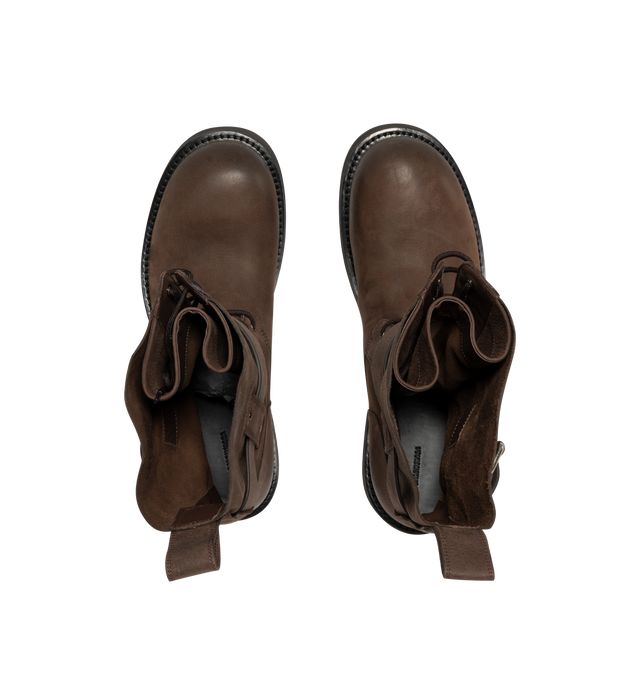 Image 4 of 4 - BROWN - Balenciaga Mens Venom Lace-Up Booties are crafted from grained calfskin leather. Feature a lace-up design, extra round toe, adjustable buckle strap, worn-in finish, debossed logo at the upper, engraved logo plate at the outsole, back pull loop, and thick toothed rubber sole. Main Material: Upper: Calfskin Leather; Sole: TPU; Insole: Calfskin Leather. Made in Italy. 