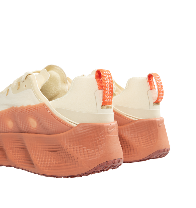 Image 3 of 5 - PINK - Nike Ava Rover featuring a stacked ReactX midsole and an ultralight outsole and sleek, breathable upper.  Mudguards wrap around the lightweight upper to help you feel locked in. Perforations on the top of the shoe enhance breathability. The oversized midsole is made with performance-level ReactX foam for ultra-comfortable cushioning. A thin layer of rubber on the outsole adds grip only where you need it, keeping the shoe light and flexible. 