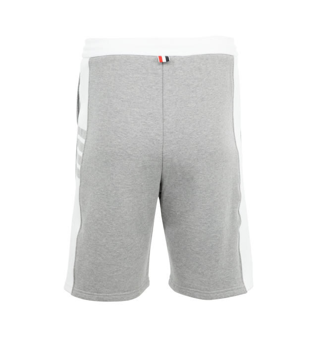 Image 2 of 3 - GREY - Thom Browne Men's Classic Loopback 4-Bar Sweatshorts made from breathable cotton fabric. Pull-on style featuring drawstring waistband with silver tone aglets, 4-bar detailing, name tag applique, side slip pockets and signature striped grosgrain loop tab. 100% Cotton. Made in Japan. 