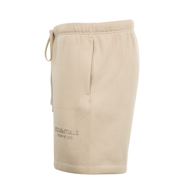 Image 3 of 3 - NEUTRAL - FEAR OF GOD Soccer Fleece Shorts featuring side pockets, elastic waistband with drawstring and logo details. 80% cotton, 20% polyester. 