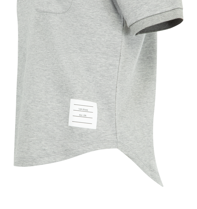 Image 3 of 3 - GREY - THOM BROWNE Cotton Milano Tee featuring ribbed neckline and cuffs, patch chest pocket, curved stepped hem, name tag appliqu and signature striped grosgrain loop tab. 100% cotton. Made in Italy. 