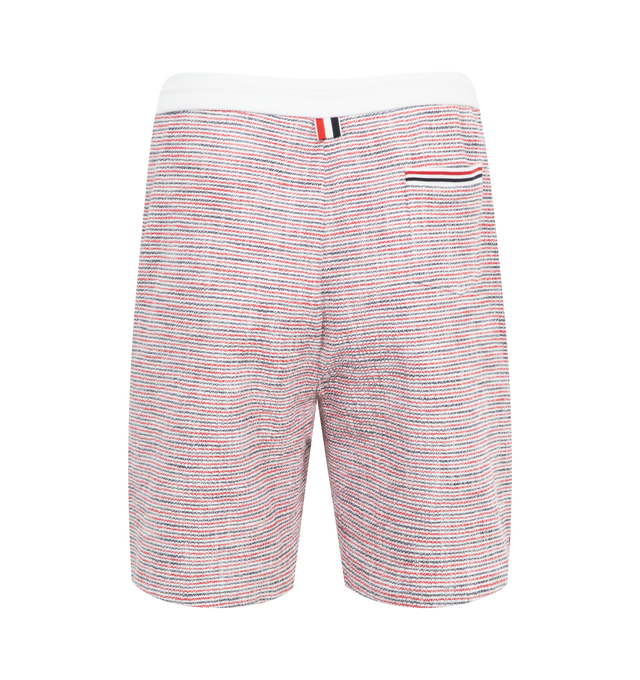 Image 2 of 3 - RED - Thom Browne Mid Thigh Tweed Summer Shorts have a drawstring waist, side pockets, a back patch pocket, a name tag applique, and a signature striped grosgrain loop tab. 100% cotton. Made in Italy.  