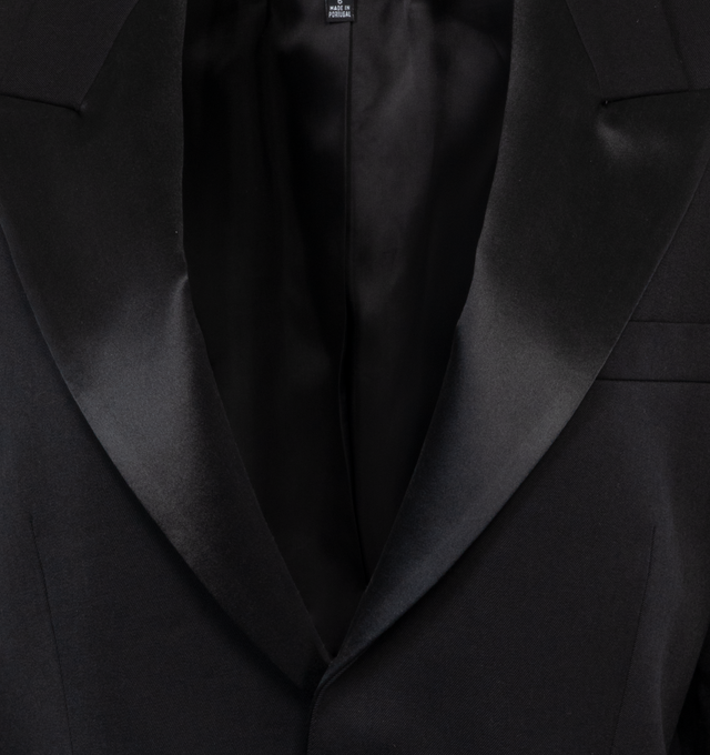 Image 3 of 3 - BLACK - NILI LOTAN LEANDRE TUXEDO BLAZER featuring relaxed tuxedo jacket, exaggerated lapels, soft structured shoulder pads, tuxedo combo details and button closure. 100% virgin wool. 